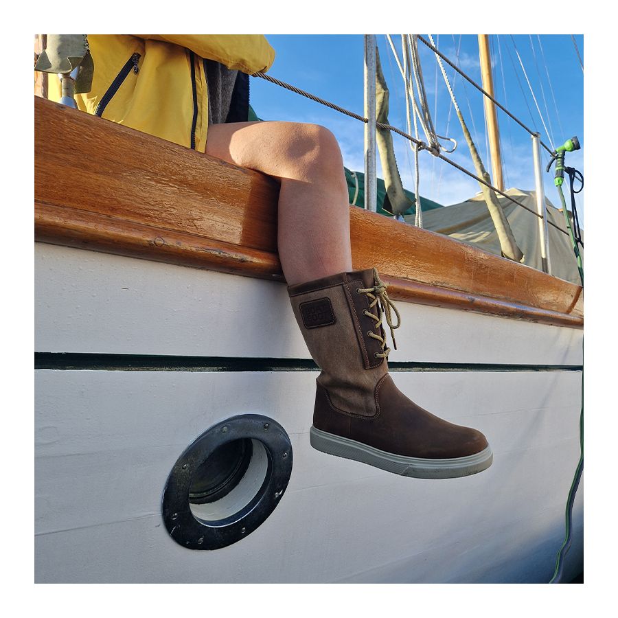 Brown leather and canvas tall sailing boots