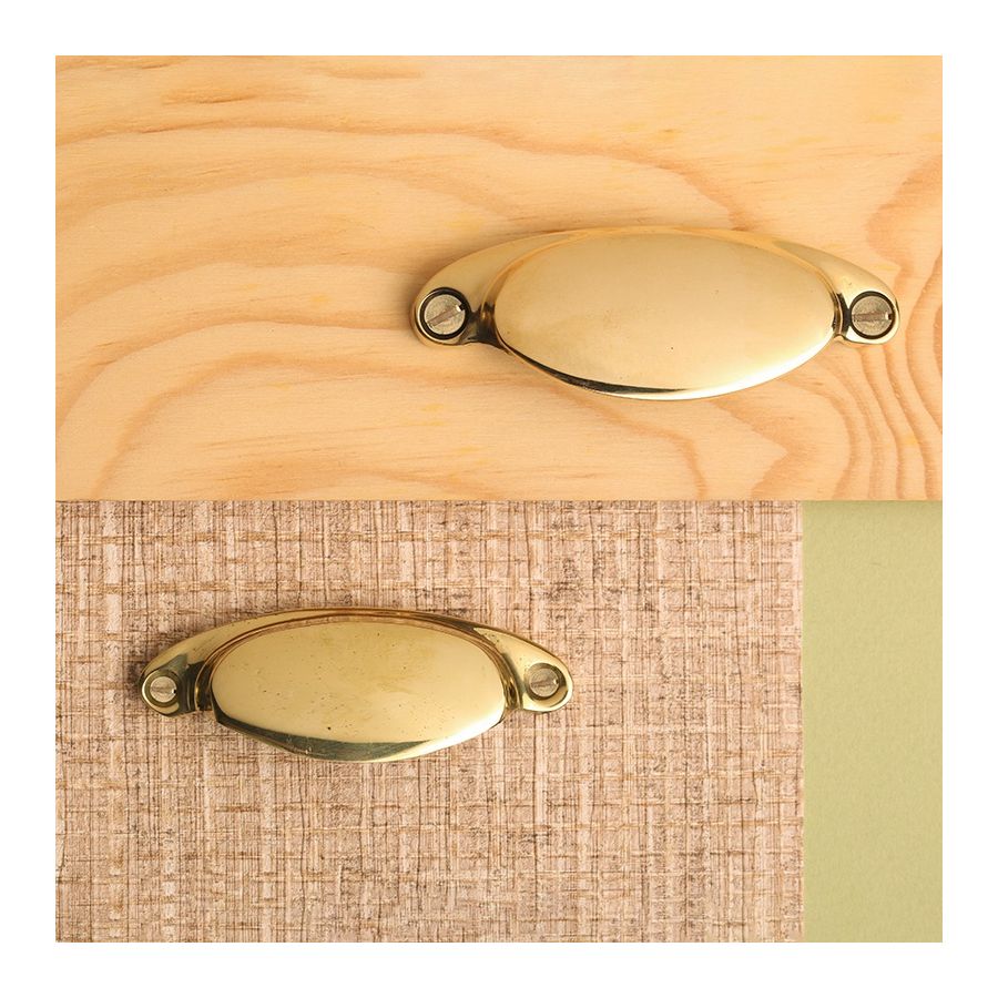 Brass drawer pull with oval shape